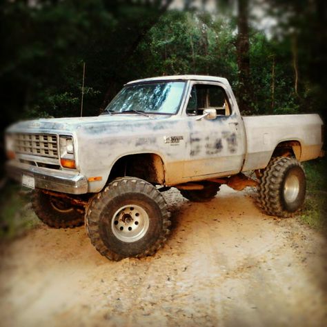 "my very first truck i bought it all by myself very proud of it there is soon to be alot of parts ordered for it its a 84 dodge power ram with a 9 inch superlift on 40 inch gumbo monster mudders", Says C.J. Langford. Dodge W150 4x4, First Gen Dodge, Dodge Ram 2500 Cummins, Power Ram, Lifted Dodge, Dodge Pickup Trucks, Man Trucks, Old Dodge Trucks, Dodge Diesel