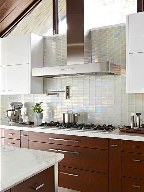 Iridescent glass tile backsplash. Not sure if this would work with the industrial farmhouse approach I want, but it is pretty and I like that it is sort of white but also really interesting. Glass Tiles Kitchen, Glass Tile Backsplash Kitchen, Glass Backsplash Kitchen, Glass Tile Backsplash, Diy Kitchen Decor, New Kitchen Cabinets, Glass Backsplash, Kitchen Tiles Backsplash, Kitchen Wallpaper