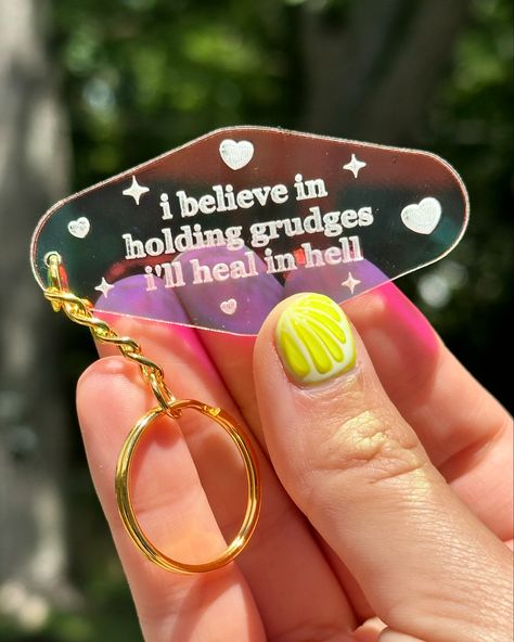 Fresh new photos of some of my keychains ✨ my keychains make fantastic gifts. They are all made and designed in house by ME. I use eye catching iridescent acrylic paired with a gold chain! My keychains are $12 and I sell them in my Etsy, Shopify and FAIRE. I have all sorts of dumb relatable phrases on them! Positive Quotes Keychain, Acrylic Keychain Ideas, House Keychain, Iridescent Acrylic, Acrylic Keychains, Photo Keychain, Nail Jewelry, Keychain Design, Acrylic Keychain