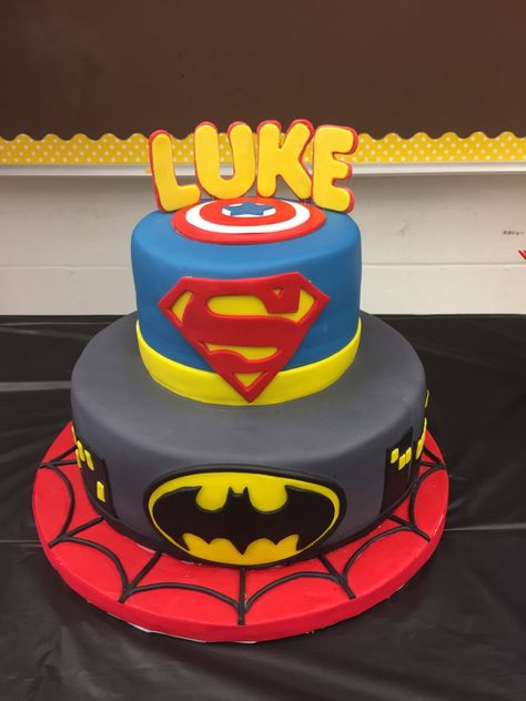 Batman, Superman, Spider-Man Superhero cake for Superhero theme Baby Shower. 2 tier cake. Superman Cake Design, Half Princess Half Superhero Cake, Birthday Cake Superman, 2 Tier Superhero Cake, Avengers Cake 2 Tier, Two Tier Batman Cake Birthday, Baby Shower Banner Girl, Tiered Superhero Cake, Baby Shower Cake Table