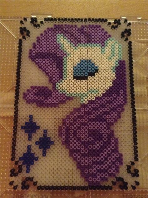 Rarity my little pony in coaster form! Made with Perler beads. Rarity Perler Beads, My Little Pony Perler Bead Patterns, My Little Pony Perler Beads, Mlp Perler Beads, Melt Beads Patterns, My Little Pony Rarity, Hamma Beads Ideas, Easy Perler Bead Patterns, Pixel Beads