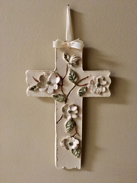 Handbuilt ceramic cross with dogwood blossoms Cross Clay Ideas, Ceramic Crosses Ideas, Clay Crosses Ceramics, Ceramic Crosses Pottery, Clay Crosses Diy, Clay Ideas To Sell, Pottery Cross, Polymer Clay Cross, Cross Ceramic