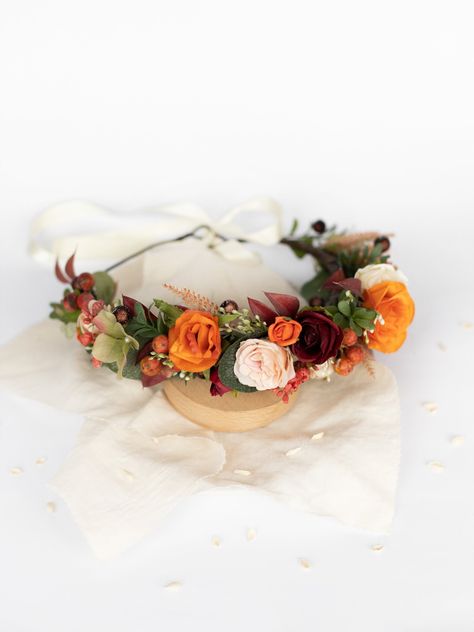 Elegant orange and burgundy flower crown is a hand-made item made in my studio. I was inspired by nature and natural color for this crown. Also, you are welcome to order custom composition, because I know how it is important to have everything perfect for your important event. During making this fall flower headband, I use only high-quality flowers and handwork to create a masterpiece that will emphasize your beauty and uniqueness in your special day. Size: Adjustable to fit both kids and adults Orange Flower Crown, Burgundy Flower Crown, Apple Orchard Wedding, Hairstylist Branding, Floral Headpiece Wedding, Flower Crown Bridesmaid, Wedding Flower Crown, Bridal Party Hair, Boho Flower Crown