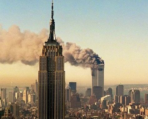 View from the north looking south at the twin towers smoking & on fire. Sept 11, 2001 World Trade Center Nyc, Tower Falling, Photo New York, Photos Rares, North Tower, Haunting Photos, The Twin Towers, We Will Never Forget, Trade Centre