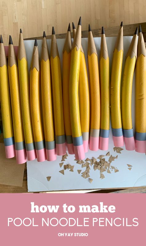 Diy Giant Pencil How To Make, Pool Noodle Markers, Pool Noodle Letters Diy, Pool Noodle Colored Pencils, Pool Noodle Classroom Decorations, Diy Large Pencil Prop, Pool Noodle Classroom Ideas, Hanging Ideas For School Decoration Diy, Pencil Diy Craft