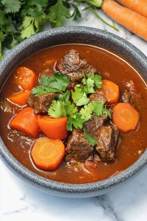 Warm up your dinner with a comforting bowl of beef and tomato stew tonight. This hearty dish is packed with rich flavors, tender beef, and savory tomatoes that will satisfy your cravings. Enjoy the delicious combination of succulent meat and robust tomato sauce simmered to perfection. Perfect for cozy nights in or family gatherings, this beef and tomato stew recipe is a classic favorite that never disappoints. Beef Tomato Recipe, Flavorful Beef Stew, Slow Cook Beef Stew, Tomato Stew, Beef Stew Recipes, Dried Orange Peel, Hearty Beef Stew, Healthy Beef, Beef Chuck