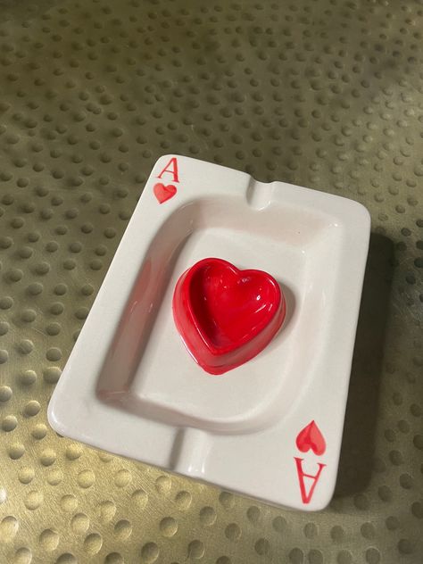 "❤️ Red Ace of Hearts Ashtray ❤️ This piece is super creative and unique.  It's the perfect size, measuring 5 1/2\" x 4\" It can be used for multiple purposes like, ashtray, home art decor, candy tray, etc.  This piece is handmade & ceramic. Extremely durable and finished in durable glaze making it very easy to wash Check out our Black Ace of Spades Ashtray:" Card Ashtray, Funky Ashtrays, Heart Shaped Ashtray Clay, Heart Ashtray, Ace Ashtray, Goth Ashtray, Handmade Tray, Candy Tray, Cosmo And Wanda