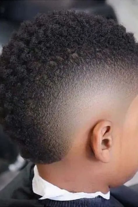 Discover the trendiest black boy haircuts for kids! From classic fades to stylish afros, we've got the perfect hairstyles to make your little one look dapper. Browse our collection of cool and versatile cuts that are sure to suit any personality. Whether you prefer a low maintenance buzz cut or edgy designs, these hairstyles will keep your kid looking sharp and confident. Get inspired and find the perfect black boy haircut that will make heads turn wherever he goes! Black Boy Haircut, Black Kids Haircuts, Mixed Boys Haircuts, Boys First Haircut, Boy Haircut Ideas, Haircuts For Kids, Stylish Boy Haircuts, Twist Out Styles, Teen Haircuts