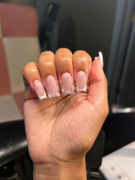 Graduation French Tip Nails, Prom Nails Medium Length, French Tip Nails Black Women, White French Tips With Rhinestones, White French Tip With Gems, Diamond French Tip Nails, Medium French Tip Acrylic Nails, Nails W Charms, Thick Acrylic Nails