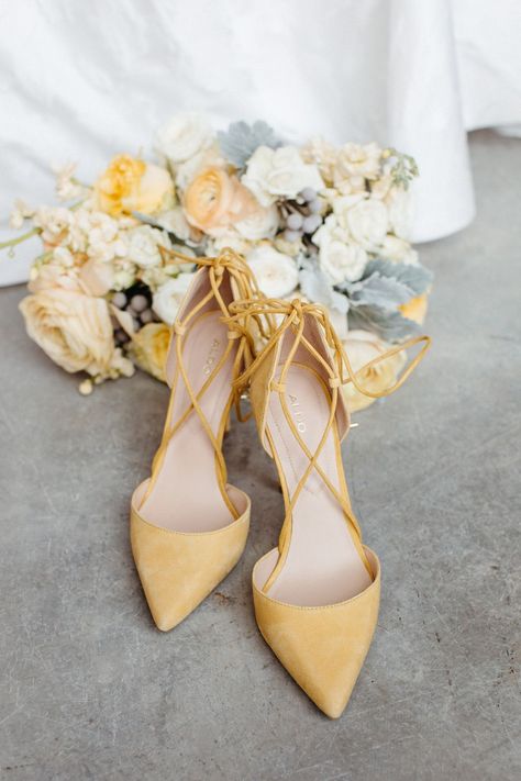 Pantone "Illuminating" wedding shoes | yellow wedding shoes | Nashville Bride Guide Yellow Wedding Shoes Brides, Yellow Wedding Theme Groomsmen, Wedding Shoes Yellow, Wedding Dress With Yellow Accents, Yellow Wedding Accents, Yellow Wedding Dress The Bride, Light Yellow Wedding Theme, Pastel Yellow Wedding Theme, Pale Yellow Wedding Theme