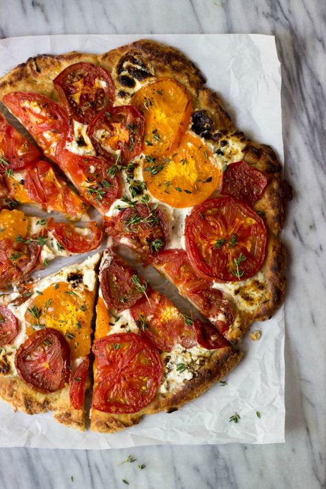 In the food space, I have heard many people refer to 'rustic' food as lazy food. And if that's the case, I'm proud to be labeled as lazy.  Because this pizza... this pizza right here... Boursin Cheese Recipes, Heirloom Tomato Tart, Cottagecore Food, Tomato Pizza, Homemade Greek Yogurt, Gluten Free Crust, Boursin Cheese, Tomato Tart, Heirloom Tomato