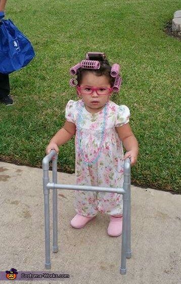 Samantha: My daughter Leila Renee. She's a clumsy little thing so I decided to make her a walker out of 1/2 pic pipe and painted it silver. Put her on a... Old Man Halloween Costume, Kids Old Lady Costume, Old People Costume, Costumes For Babies, Old Lady Dress, Toddler Dress Up, Old Lady Costume, School Costume, Cheap Glasses