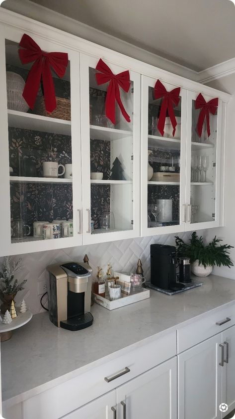 I added some simple red bows to my Butler's pantry cabinets and I love how they look above our coffee bar. ���😍 Walmart fines, Walmart Christmas, red bows, Christmas decor, Walmart Christmas decorations Follow me in the @LTK shopping app to shop this post and get my exclusive app-only-content! #liketkit #LTKSeasonal #LTKHoliday #LTKhome @shop.ltk https://liketk.it/4r3gS Above Cabinet Decor, Walmart Christmas, Christmas Decorations Apartment, Above Cabinets, Pantry Cabinets, Bows Christmas, Christmas Apartment, Red Wreath, Traditional Christmas Decorations