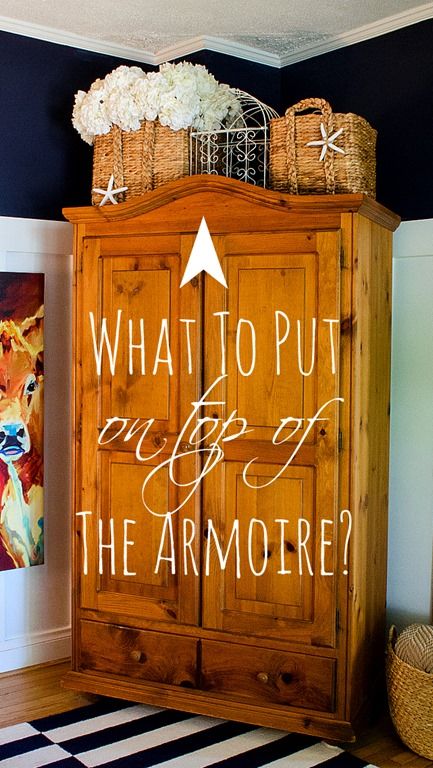 How To Style A Cabinet Top Styling Top Of Armoire Living Rooms, How To Style The Top Of An Armoire, Dining Room Armoire Ideas, Baskets On Top Of Hutch, Top Of Hutch Decor Ideas, Top Of Wardrobe Decor, Top Of Armoire Decor, Decorating Top Of Hutch, Top Of Hutch Decor