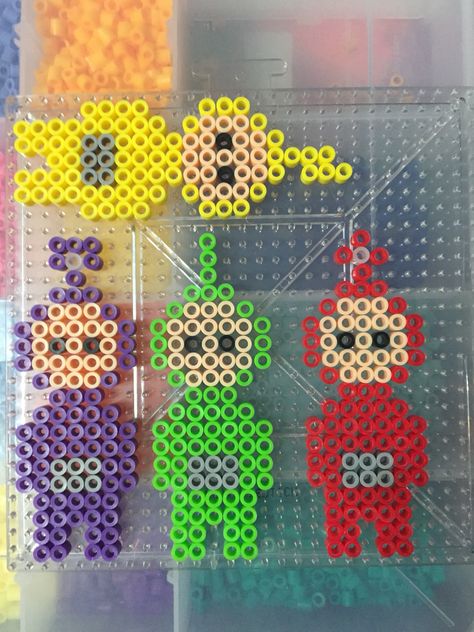 Teletubbies perler beads done by BreAnda Robbins Melty Bead Designs, Melt Beads Patterns, Hamma Beads Ideas, Melty Bead Patterns, Pearl Beads Pattern, Easy Perler Beads Ideas, Art Perle, Bracelets Ideas, Pony Bead Patterns