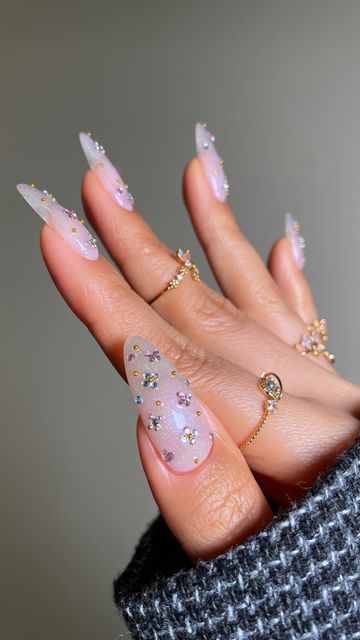 San Sung Kim | 김산성 on Instagram: "🎀🌸💗 … I fell in love with my new @shopgirlscrew rings* that I had to create a set entirely based on the dainty details. I wish you could see these rings paired w/ my nails in real life. I can’t stop staring at them because my hands have never looked this good. *PR/gifted **Rhinestones from Amazon sf (link in bio)" Nails Rhinestones, Horror Nails, Nail Rhinestones, Nail Jewels, Edgy Nails, Nails Only, Stop Staring, Gem Nails, Mixed Feelings