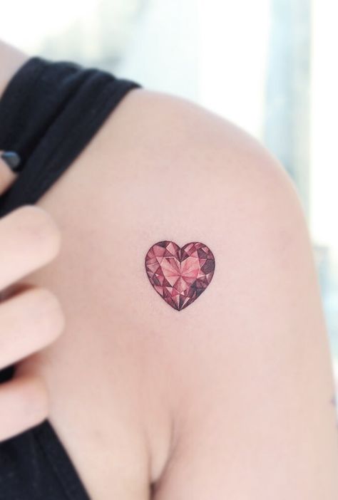 A women's lifestyle destination dedicated to style, entertainment, love, and living beautifully. Ruby Heart Tattoo, Ruby Tattoo Ideas, Tattoos On Shoulder, Ruby Tattoo, Girls Tattoo Designs, Be Tattoo, Shoulder Tattoo Designs, Tattoos Spine, Think Tattoo