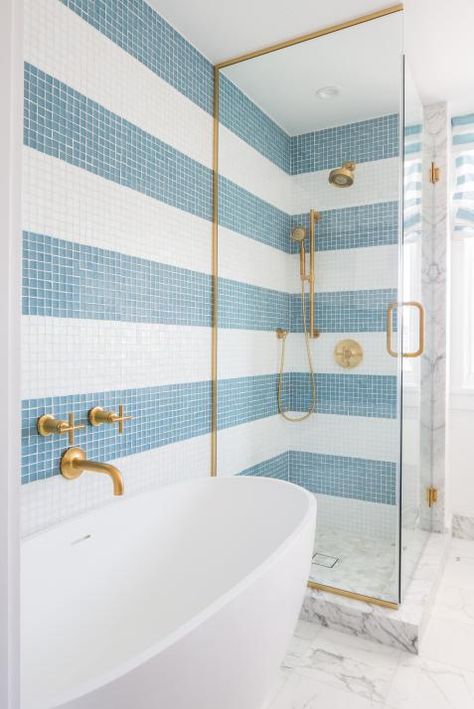 European Bathroom Design Ideas: HGTV Pictures & Tips | Bathroom Ideas & Designs | HGTV Bathroom Remodel Beach House, Beach Home Bathroom Ideas, Cool Shower Tile Ideas, California Beach Bathroom, White And Blue Shower Tile Ideas, Coastal Boho Office, Cottage Core Beach House, Coastal Kids Bathroom, Ecclectic Bathroom