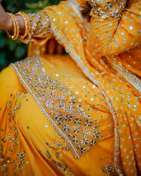 GULAAL is a classic majestic look, well suited for formal occasions. This beautiful Mustard yellow sharara is adorned with reverie like embellishments, rendered in a glowing pearl, gotta and zardozi work. Paired with gorgeously accented flowy raw silk sharara with motif spray and adorned borders. The elegant look is completed with an chunri chiffon dupatta, adding details of kiran lace, to make it an ideal festive wear. #SN #snatelie #launchingsoon Raw Silk Sharara, Yellow Sharara, Silk Sharara, Zardozi Work, Adding Details, Chiffon Dupatta, Festive Wear, Raw Silk, Festival Wear