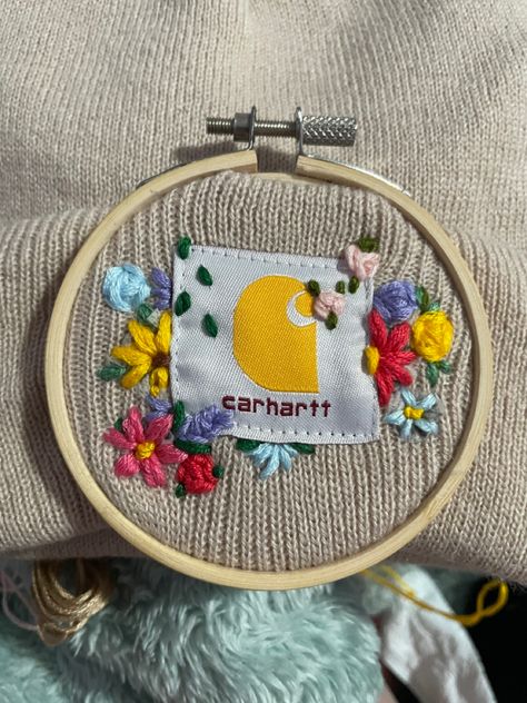 How To Embroider A Beanie By Hand, Hand Embroidery Beanies, Embroidered Carhartt Beanie Flowers, How To Embroider Carhartt Beanie, Hand Embroidery On Hats, Hand Embroidery Carhartt Beanie, Embroidery On Carhartt Hat, Carhartt Beanie Embroidery Flowers, Embroidered Carhartt Beanie Diy