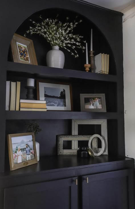 Black Shelves Styling, Black Bookshelf Styling Living Room, Dark Wood Bookcase Styling, Traditional Bookshelf Styling, How To Decorate Top Of Bookcase, Decorating Dark Bookshelves, Styling Dark Bookshelves, Black Bookcase Styling, Black Book Shelves