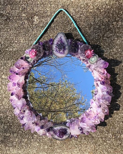 What do y’all think? 🔮 I am so excited to share this #mirror that I have been working on in my downtime 🙌🏻 I am super proud of it 😭💗 It is… Amethyst Mirror, Crystal Room Decor, Crystal Mirror, Crystal Room, Witchy Crafts, Crystal Crafts, Diy Crystals, Beautiful Mirrors, Crystals In The Home