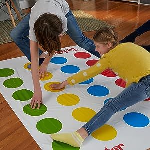 TWISTER GAME CHALLENGES KIDS: The Twister game challenges players to put their hands and feet in different places on the mat without falling over. ICONIC TWISTER GAMEPLAY: Remember playing the Twister game when you were a kid? Featuring classic Twister gameplay, the last player standing wins in this active game for everyone from 6 years old Twister Board Game, Twister Mat, Game Challenges, Twister Game, Games For Fun, Outdoor Games For Kids, Board Games For Kids, Classic Board Games, Indoor Activities For Kids