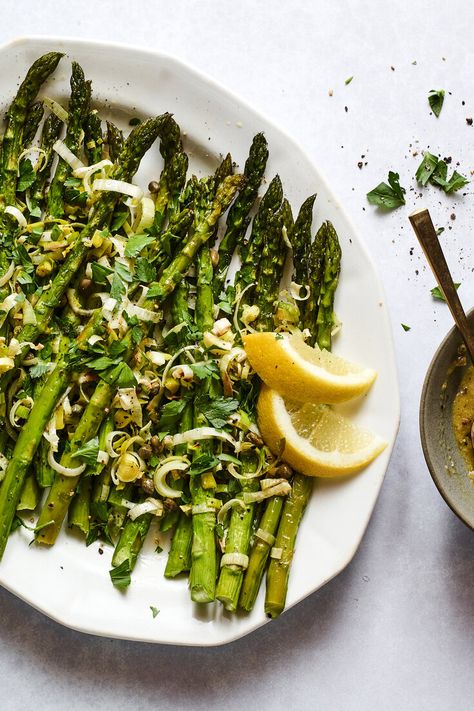 Roasted Asparagus With Crispy Leeks and Capers Recipe - NYT Cooking Leek And Asparagus, Leeks And Asparagus, Crispy Leeks, Roasted Leeks, Light Cooking, Capers Recipe, Seared Fish, Salad Inspiration, Asparagus Recipes