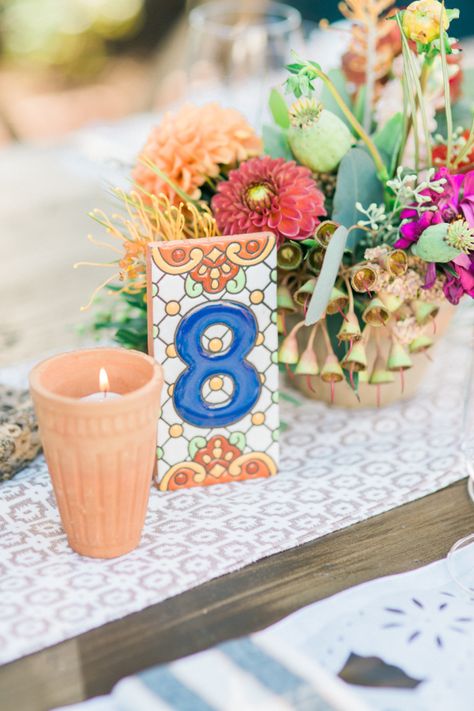 Quick Tip: Mexican Tile Table Numbers: http://www.stylemepretty.com/2015/10/22/quick-tip-mexican-tile-table-numbers/ | Photography: Honey Honey - http://www.hoooney.com/ Numbers Photography, Mexican Tile Table, Couples Table, Mexican Inspired Wedding, Mexican Themed Weddings, Diy Table Numbers, Hacienda Wedding, Honey Photography, Southwest Wedding