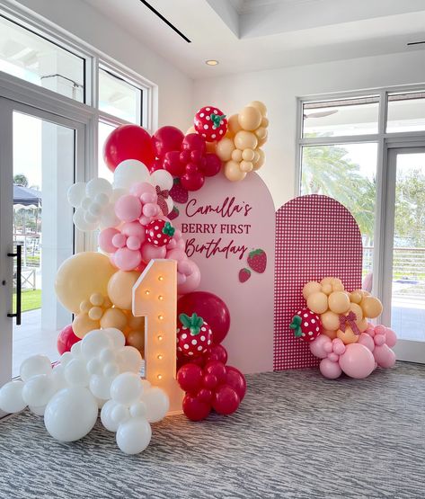 Cuteness for the sweetest berry in the patch! 🥰🍓 I’m ready to buy some farm fresh strawberries haha 😂 Happy 1st, Camilla! 💕 Backdrop, Strawberry Stand, Signage @lalawoodstory Balloons @amberandvine Marquee Number @alphalitsofl Cutouts @thepartyprintshopcorp Venue @lyc1938 Berry First Backdrop, Strawberry Birthday Backdrop, Marquee Balloons, Strawberry Balloon Arch, Strawberry Backdrop, Stand Signage, Berry Sweet 1st Birthday, Strawberry Stand, 1st Birthday Backdrop