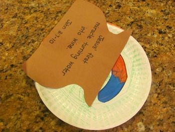 Water to Wine  Craft from Kathy Ross; she has several good books available.  Take 2 paper plates and cut out a curved section from one. Have child color 1/2 of the plate blue & the other 1/2 red. They can color the with the cut out however they wish. Put this plate on top of the red and blue plate and attach them w/a paper fastener.   Glue a brown jug cut from construction paper on one side of the plate so that it looks like the water is turning into wine as you turn the bottom plate. Water To Wine, Sunday School Projects, Jesus Crafts, Preschool Bible Lessons, Miracles Of Jesus, Bible Activities For Kids, Bible Story Crafts, Sunday School Kids, Preschool Bible