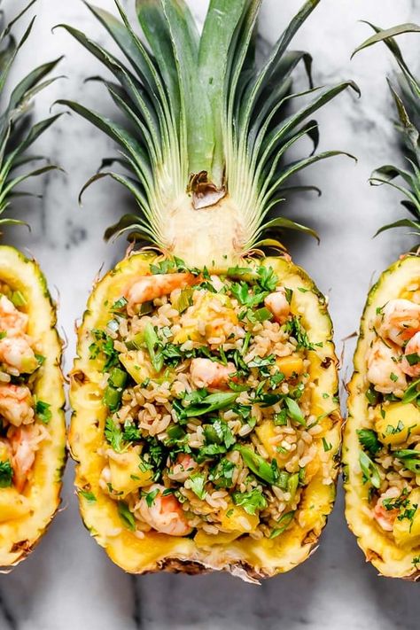 Pineapple Shrimp Fried Rice has a delicious flavor combination of savory, sweet and spicy. Serve it in hollowed out pineapples for a beautiful presentation! Pineapple Shrimp Fried Rice, Vegetarian Fried Rice, Malaysian Restaurant, Pineapple Shrimp, Making Fried Rice, Arroz Frito, Shrimp Fried Rice, Shrimp And Rice, Ww Points