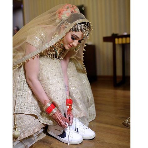 Bride In Sneakers, Indian Wedding Theme, Bridal Sneakers, Wedding Shoots, Contemporary Bride, Unique Wedding Photos, Bridal Poses, Conquer The World, Indian Bridal Dress