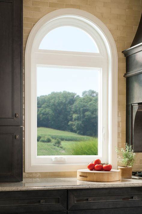 Casement window with radius top. Tuscany® Series vinyl windows from Milgard. Photo ©Milgard Mfg. Over Sink Window, Arched Kitchen, Window Over Kitchen Sink, Arched Window Treatments, Window Options, Sink Window, Arch Windows, Window Over Sink, Cottage Kitchen Cabinets