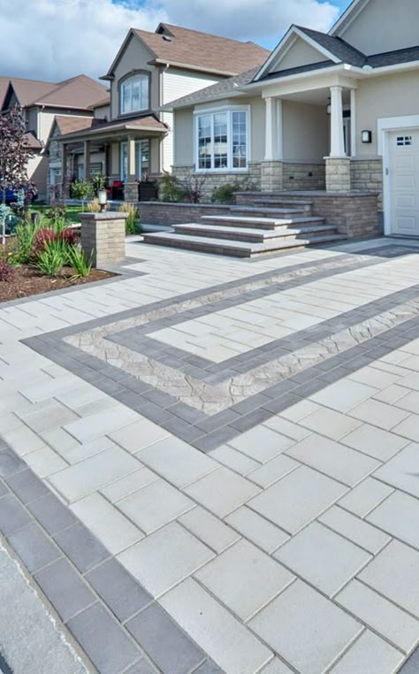 Mix colors, patterns and products to create a dynamic driveway. This modern driveway pattern added a touch of traditional with the center pavers. Driveway Pavers Design, Front Garden Ideas Driveway, Sunburst Mirrors, Garden Ideas Driveway, Modern Driveway, Paving Pattern, Paver Designs, Paving Design, Concrete Patios