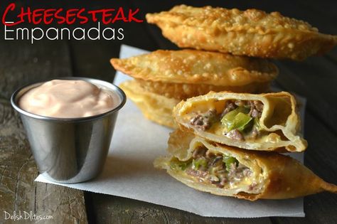 Nothing says melty, cheesy and delicious like an authentic Philly Cheesesteak sandwich. How does that get any better? Turn them into Cheesesteak Empanadas! Cheesesteak Empanadas, Live Deliciously, Sauteed Peppers And Onions, Philly Steak, Sauteed Peppers, Cheese Steak Sandwich, Lasagna Rolls, Philly Cheesesteak, Empanadas Recipe