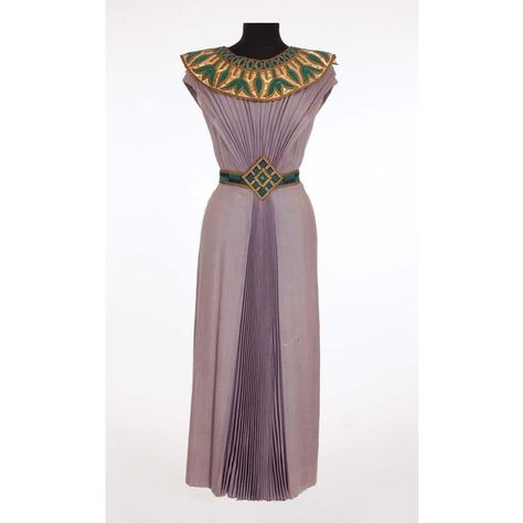 Dorothy Kirsten “Louise Heggar” Egyptian dress from The Great Caruso ❤ liked on Polyvore featuring dresses, gown, egyptian inspired dress, purple dresses and egyptian dress Egyptian Style Dress, Ancient Egyptian Dress, Egyptian Inspired Fashion, Egypt Clothing, Ancient Egyptian Fashion, Egyptian Dress, Ancient Egypt Fashion, Egyptian Clothing, Egyptian Fashion