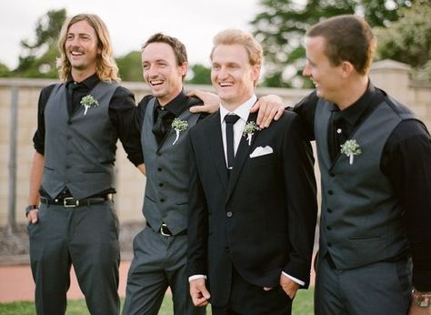 Black tux for groom, groomsmen in dark gray with black shirts Black Shirt Black Vest Men Groomsmen, Black And Grey Suit Men Wedding, Black And Grey Groomsmen, Dark Gray Groomsmen Attire, Black And Gray Groomsmen Attire, Black Vest Groomsmen, Grey And Black Groomsmen Suits, Black And Grey Groomsmen Attire, Black Shirt Groomsmen