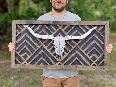 Discover the perfect blend of rustic charm and artistic flair with our Aztec Inspired Geometric Wood Wall Art. This unique piece features a captivating quilt pattern, meticulously handcrafted from high-quality wood, and a striking steel mounted longhorn, adding a touch of Western allure to any space. Our Geometric Wood Wall Decor is not just a piece of art; it's a conversation starter. The intricate quilt pattern draws the eye, while the steel longhorn mounted on 1-inch standoffs adds depth and Intricate Quilt, Diamond Quilt Pattern, Aztec Wall Art, Geometric Wood Wall Art, Geometric Wood Wall, Quilt Pattern Book, Barn Quilt Patterns, Wall Accent, Handcrafted Decor