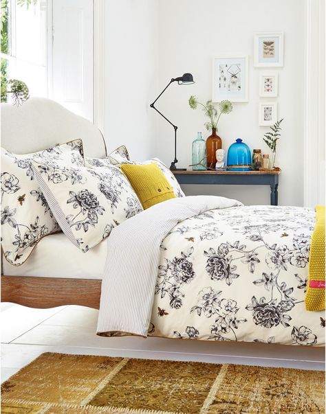 Joules Imogen Floral Duvet Cover, Crème.                     Our floral and bee print was such a hit we’ve added it to our bedding range.  Fresh hand-drawn floral is brought to life with a golden bee, while a fresh contrasting stripe reverse provides the perfect base.  We think you’ll agree that it’s the bee’s knees.  Matching pillowcases available. Bee Bedding, Joules Bedding, Mustard Bedding, Cream Bedding, Bed Linen Design, King Size Duvet, White Duvet Covers, Floral Duvet Cover, Floral Bedding