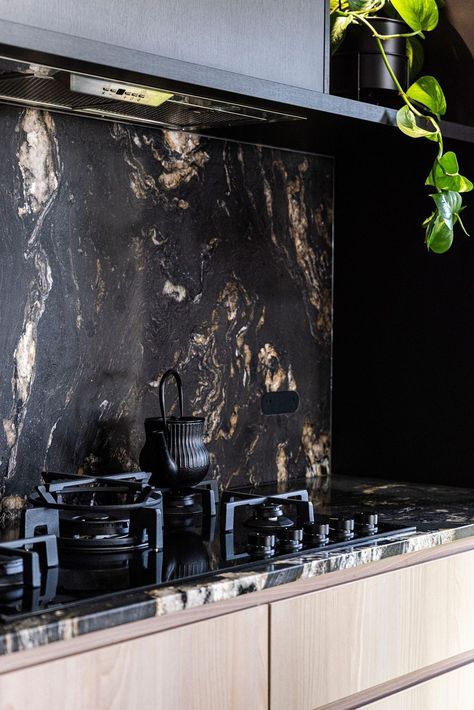 Titanium Granite takes centre stage in this bold kitchen designed by @sdi_interior_design_studio . The rich colours of the Titanium Granite are complemented by warm timber cabinetry and brass tapware. ⁣⁣Image By @aaronjonesphoto ⁣⁣⁣⁣#cdkstone #titaniumgranite #naturalstone #naturalbeauty #naturesmasterpiece #designstyle #natural #stone #interiors #exteriors #designinspo #designinspiration #natural #interiors #stone #interiordecor #designoftheday Timber Cabinetry, Titanium Granite, Brass Tapware, Natural Interiors, Bold Kitchen, Centre Stage, Craftsman House Plans, Craftsman House, Center Stage