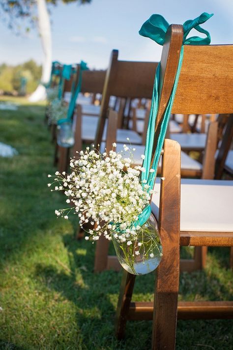 Mason Jars Hanging from Chairs With A Turquoise Bow. Pefect For a Beach Theme Wedding. Diy Wedding Aisle Runner, Wedding Aisles, Wedding Aisle Outdoor, Beach Wedding Decorations Reception, Aisle Runner Wedding, Trendy Diy, Wedding Aisle Decorations, Teal Wedding, Turquoise Wedding