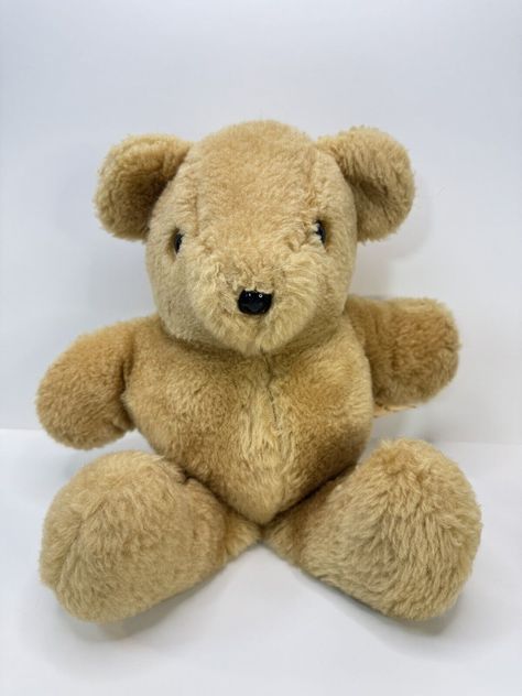 This vintage stuffed animal is a must-have for any collector or fan of Merrilee Woods' designs. Made in 1993 at the Bear Factory, this small (6-14 in) brown bear is a perfect addition to any collection. The bear is recommended for adults and has not been modified in any way. The bear is stuffed with high-quality materials and features a soft and cuddly texture. It is a perfect gift for anyone who loves vintage stuffed animals or wants to add a unique piece to their collection. Don't miss out on this opportunity to own a piece of history! Good used condition. Vintage Stuffed Animals, Brown Bear, The Bear, The Collector, Stuffed Animal, Stuffed Animals, Unique Pieces, Perfect Gift, Fan