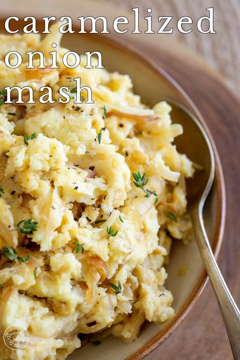 These Caramelized Onion Mashed Potatoes are the perfect balance between simplicity and indulgence. The velvety, buttery, creamy mashed potatoes are infused with rich, sweet-savory caramelized onions and a sprinkle of thyme. Giving you a side dish with the warmth and comfort that good food brings. So whether you're gearing up for a festive holiday feast, a hearty Sunday roast, or a simple midweek meal with chicken or steak, this recipe is your ticket to comfort-food heaven. Mashed Potatoes And Onions, Carmelized Onion Mashed Potatoes Recipe, Mashed Potatoes With Onions, Carmalized Onion Mashed Potatoes, Caramelized Onion Mashed Potatoes, Onion Mashed Potatoes, Meal With Chicken, Potatoes Dishes, Roasted Potatoes And Onions