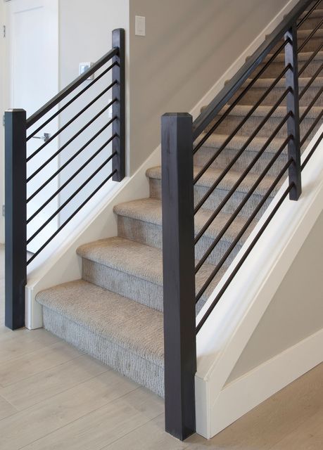 L.J. Smith Stair Systems on Instagram: "Our 5/8-in hollow low sheen black tube provides a sleek and modern interior stairway design with a bit more prominence on the horizontal infill than our cable system. - http://ow.ly/3EOz50Lrcq0 - #LJSmith #StairExperts #StairInspiration #StairRemodel" Horizontal Black Railing Stairs, Metal Horizontal Stair Railing, Horizontal Metal Railings Indoor, White Steel Staircase, Lj Smith Stair System, Stair Newel Post, Small Staircase, Interior Stair Railing, Staircase Railing Design