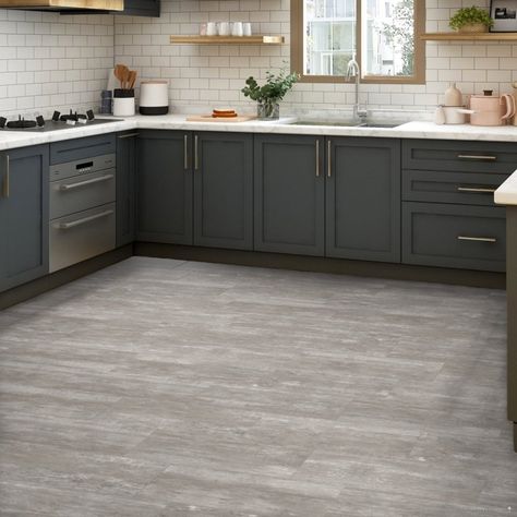 Our Rushmore range of vinyl click tiles are 300 mm wide, 600 mm long and surrounded by a subtle bevel creating the look of a real tiled floor. These floors are created with a limestone core and soft vinyl top to create a floor that is fully waterproof and has a higher slip resistance – a must for bathrooms and kitchens. Kitchen With Light Gray Floors, Farmhouse Kitchen Grey Floors, Kitchen With Grey Flooring, Gray Floor Kitchen Ideas Color Schemes, Light Grey Kitchen Floor, Light Grey Floors Kitchen, Grey Kitchen Floors, Modern Kitchen Grey Floor, Grey Flooring Kitchen