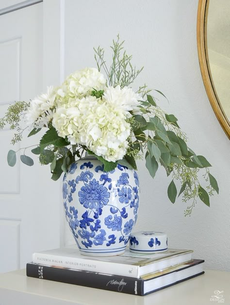 white hydrangeas in a blue chinosserie vase decorating with coffee table books fall flowers with seeded eucalyptus fall decorating-1 Blue And White Vases With Flowers, Vasos Vintage, Chinoiserie Wedding, Blue White Decor, Blue And White Vase, Island Decor, White Vase, White Pottery, Vase Arrangements