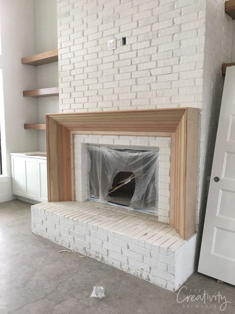 Client Project Updates: Back From Long Break Fireplace With Doors On Both Sides, French Country Fireplace Mantels, Brick Hearth Makeover, Brick And Cast Stone Fireplace, Low Profile Fireplace Hearth, Fireplace Raised Off Floor, New Construction Fireplace Ideas, Modernize Brick Fireplace, Removing Brick From Fireplace