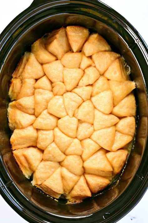 Crock Pot Chicken and Dumplings are easy to make with tender chicken pieces and vegetables in a creamy sauce with flaky dumplings on top. Crock Pot Chicken And Dumplings With Biscuits, Crockpot Chicken Dumplings Biscuits, Chicken Dumpling Crockpot Recipes, Crockpot Chicken And Dumplings Canned Biscuits, Crock Pot Chicken N Dumplings, Crescent Roll Chicken And Dumplings, Crock Pot Chicken And Dumplings Bisquick, Crock Pot Chicken And Dumplings Crockpot, Easy Crock Pot Chicken And Dumplings