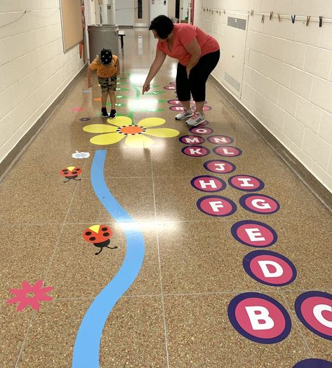 Davis Elementary gets sensory path - North Country Healthy Heart Network Floor Sensory Path, Sensory Floor Path Ideas, Sensory Hallway, Sensory Trail, Sensory Walk, Sensory Classroom, Sensory Pathways, Sensory Path, Clean Classroom